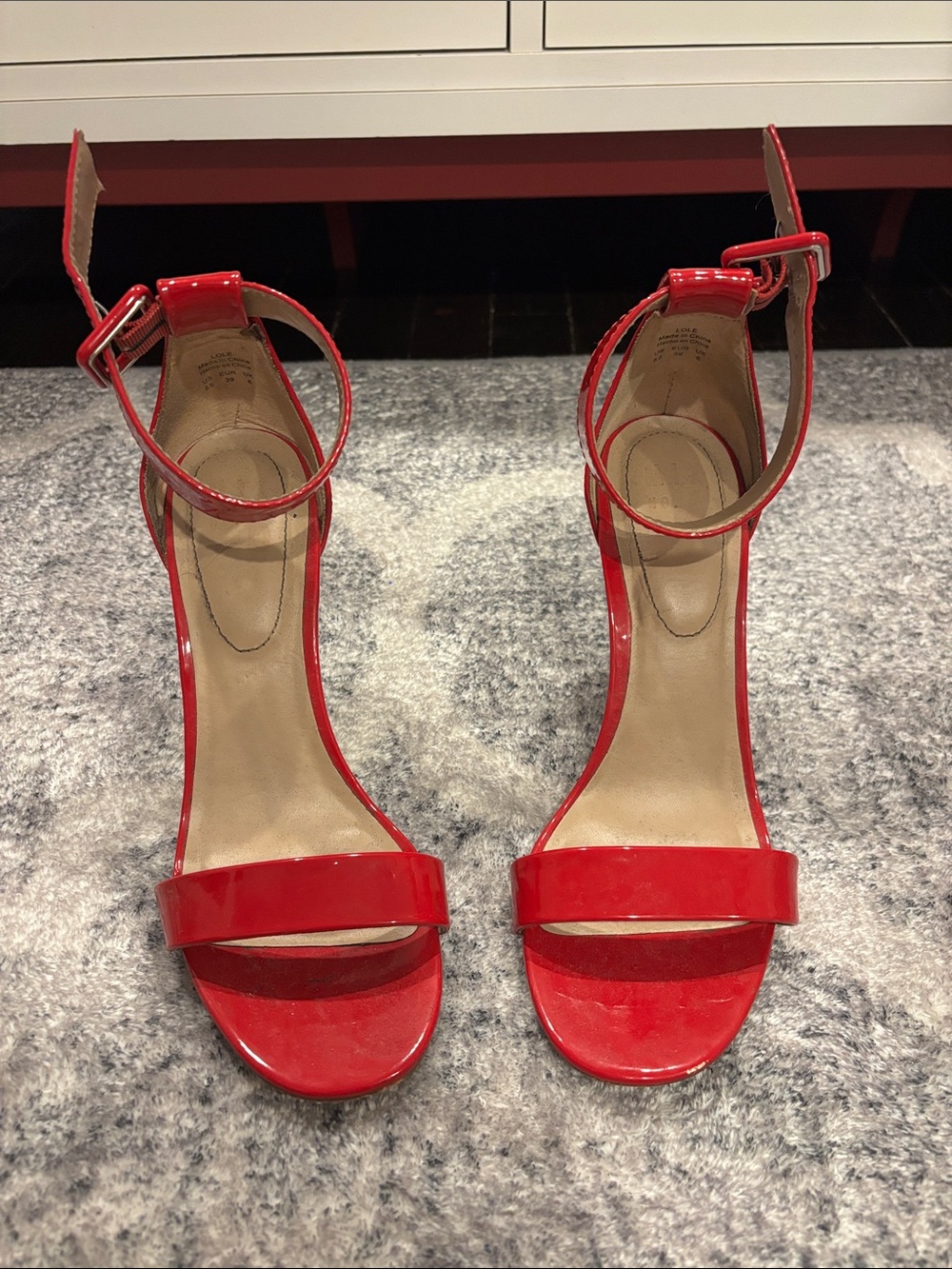 Woman’s red heels
